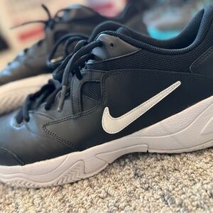 Nike Black and White Athletic Shoes with Swoosh Logo